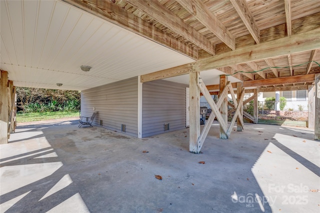 view of patio featuring a carport