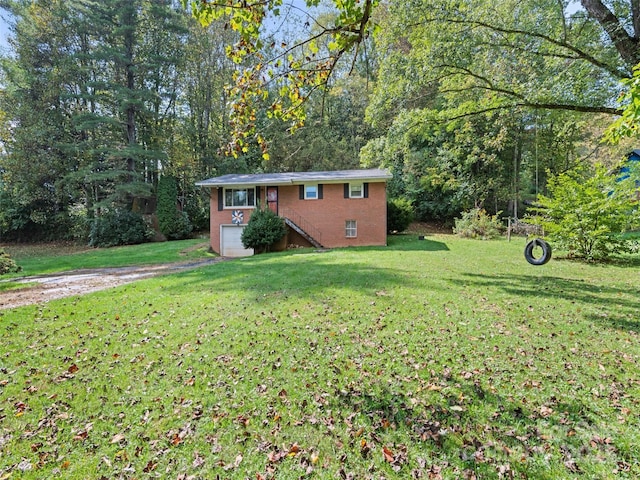 view of yard with a garage