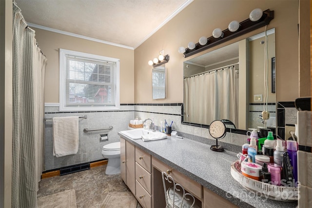 bathroom featuring toilet, crown molding, tile walls, a textured ceiling, and vanity