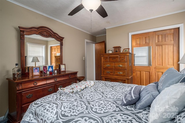 bedroom with crown molding, a textured ceiling, and ceiling fan