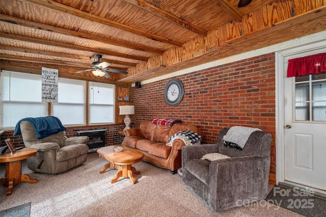 living room with carpet flooring, brick wall, beam ceiling, and wooden ceiling