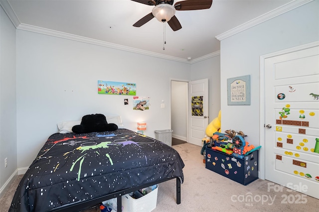 bedroom featuring ornamental molding, carpet flooring, and ceiling fan