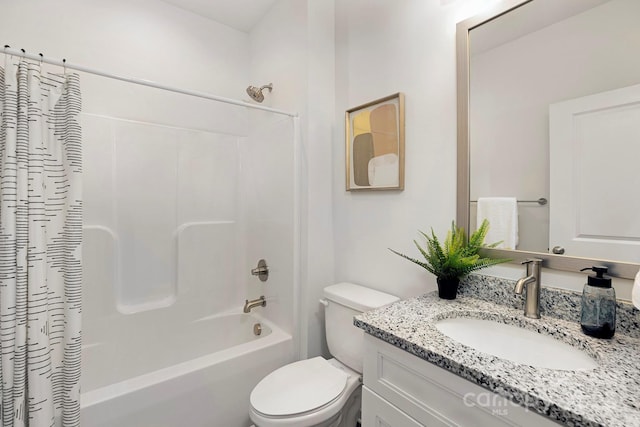 full bathroom featuring vanity, toilet, and shower / bath combo