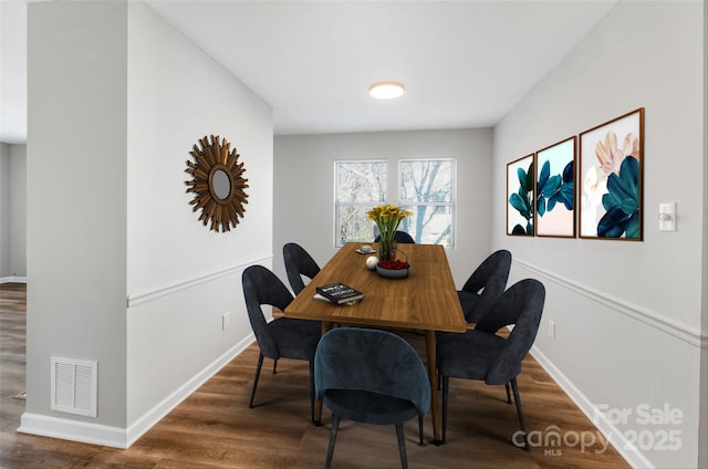 dining room featuring hardwood / wood-style flooring