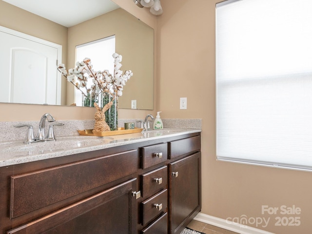 bathroom featuring vanity and tile patterned flooring