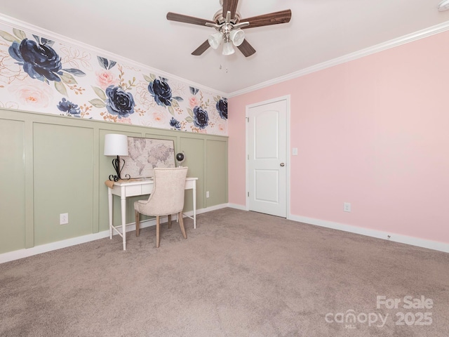 carpeted home office featuring ceiling fan and ornamental molding