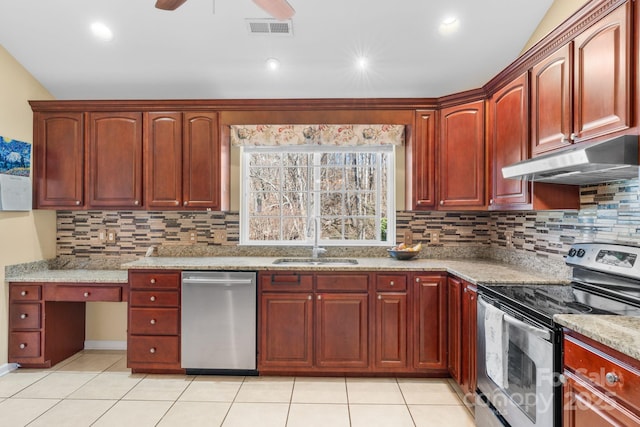 kitchen with visible vents, under cabinet range hood, appliances with stainless steel finishes, a ceiling fan, and a sink