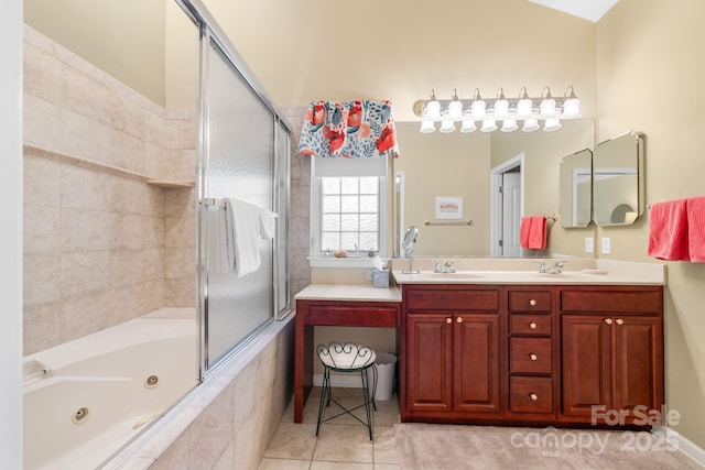 bathroom featuring tile patterned floors, a sink, and double vanity