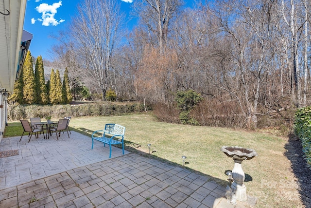 view of patio featuring a fire pit