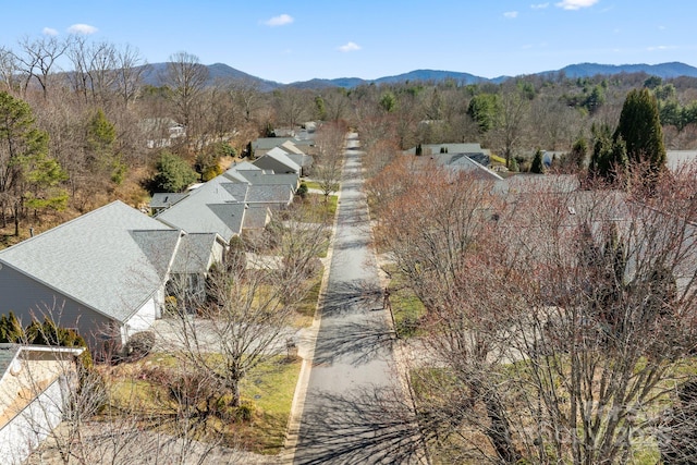 birds eye view of property with a mountain view