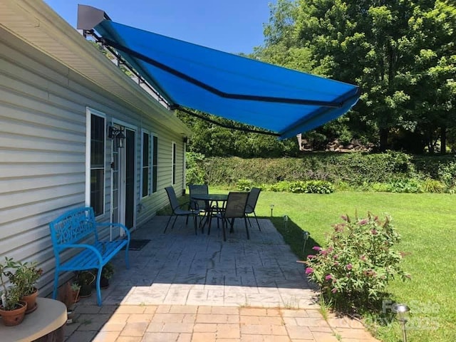 view of patio featuring outdoor dining space