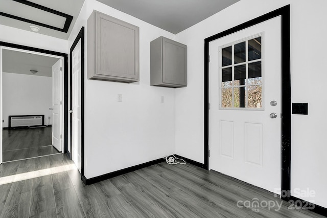 doorway featuring dark hardwood / wood-style flooring