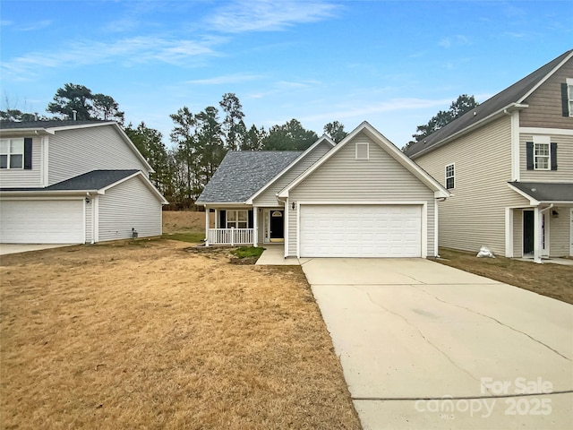 front facade with a garage, covered porch, and a front yard