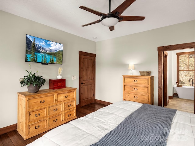 bedroom with dark wood-type flooring and ceiling fan