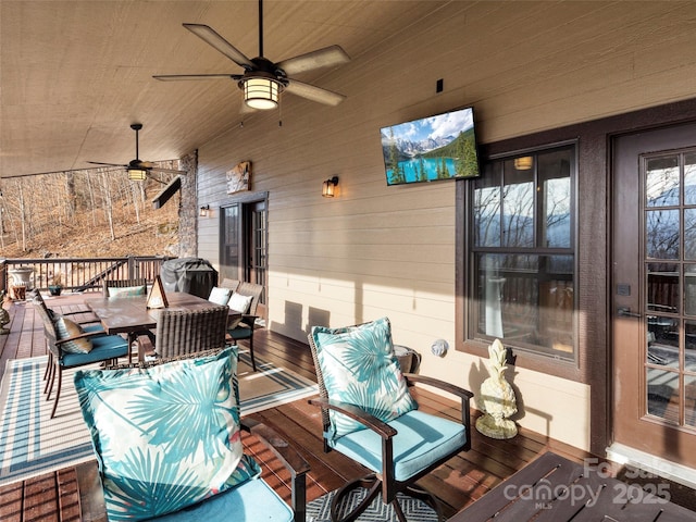 interior space featuring ceiling fan