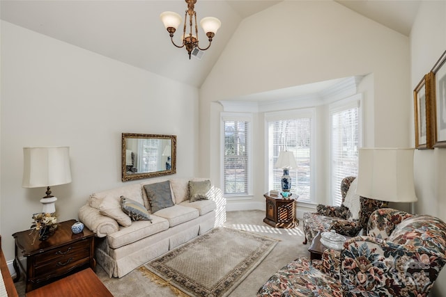 carpeted living room featuring an inviting chandelier, lofted ceiling, and plenty of natural light