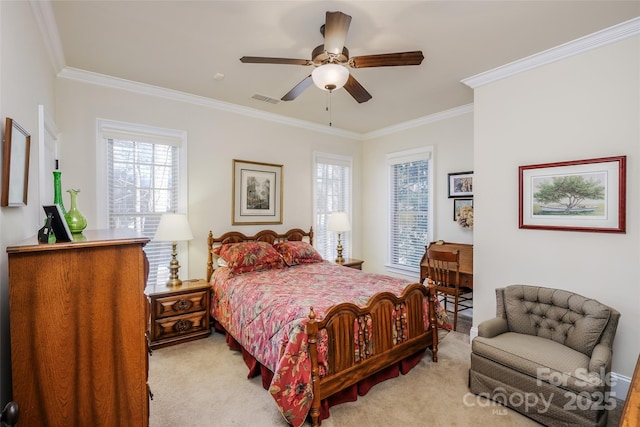 carpeted bedroom with ornamental molding and ceiling fan