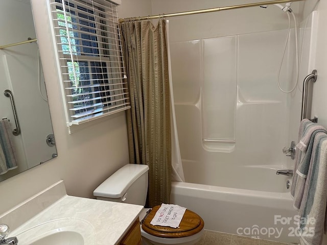 full bathroom featuring vanity, toilet, and shower / tub combo