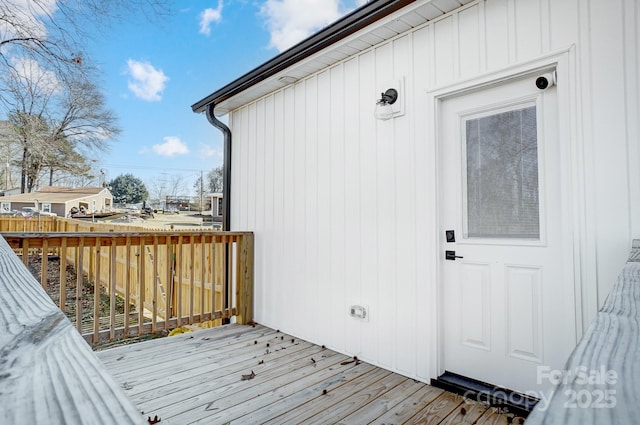 entrance to property with a deck