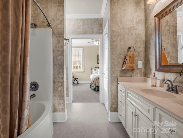 bathroom featuring vanity, ornamental molding, and shower / bath combo with shower curtain