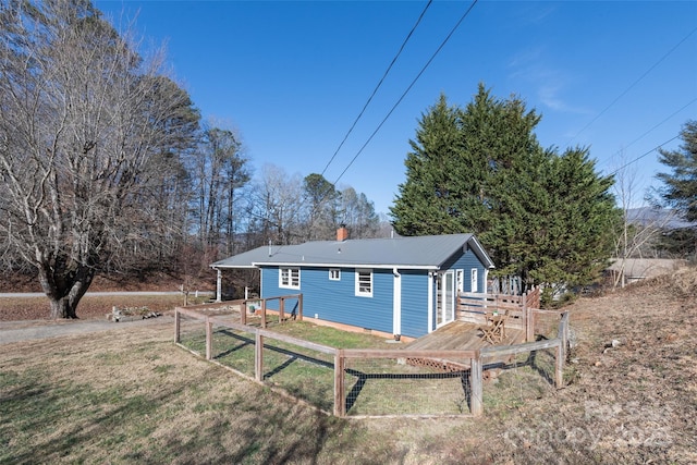 exterior space featuring a yard