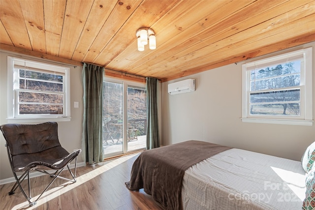 bedroom featuring a wall mounted air conditioner, access to exterior, wood ceiling, and light hardwood / wood-style floors