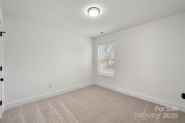 view of carpeted spare room