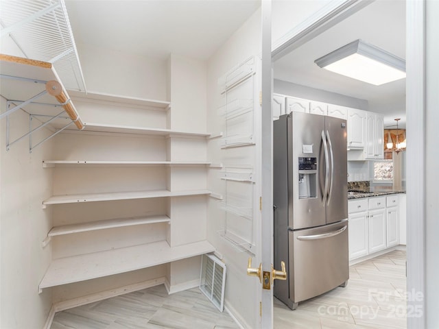 pantry featuring visible vents