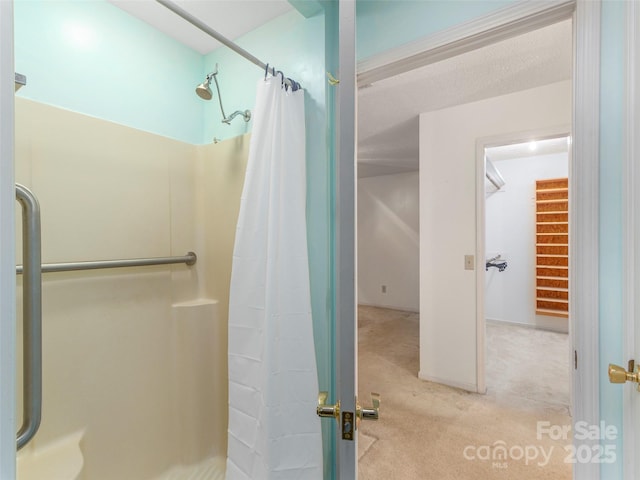 bathroom with a shower with shower curtain