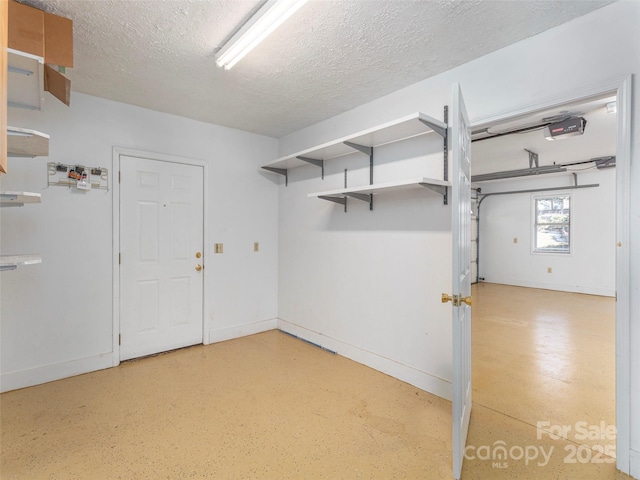 garage with baseboards