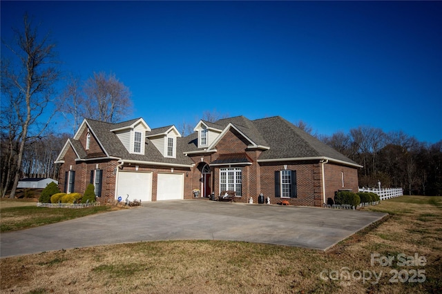 view of front facade featuring a garage and a front yard