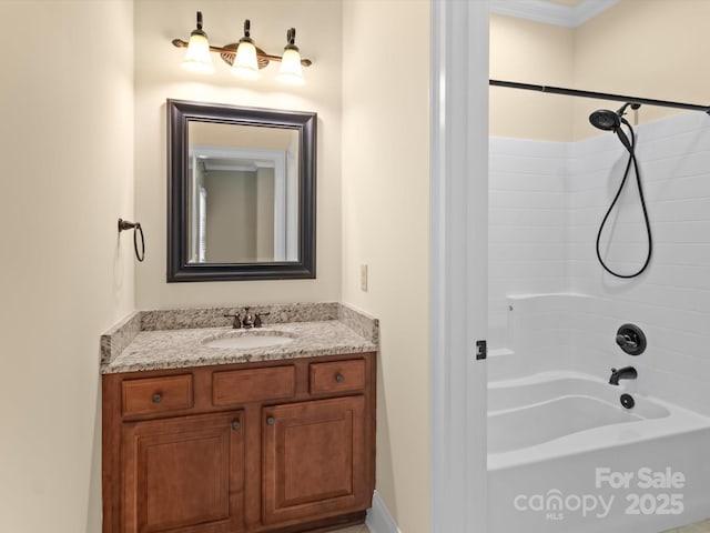 bathroom featuring vanity and washtub / shower combination