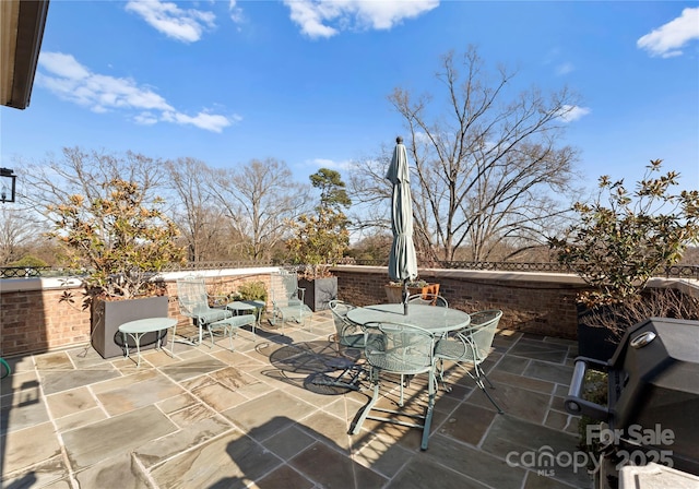 view of patio / terrace featuring a grill