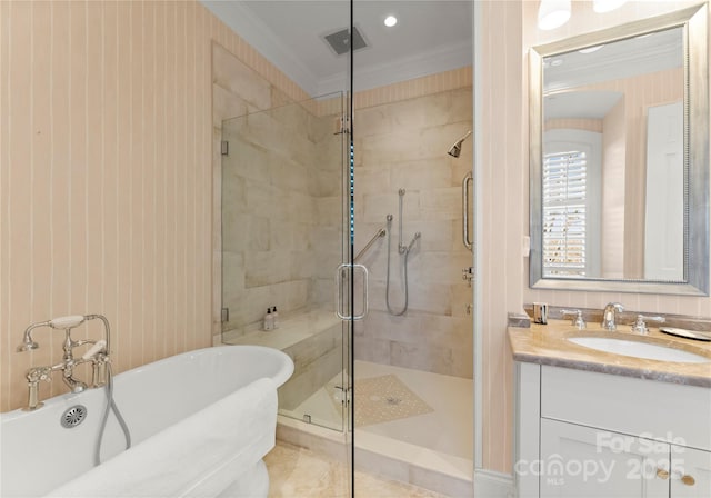 bathroom featuring crown molding, shower with separate bathtub, and vanity