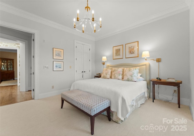 bedroom featuring crown molding, light colored carpet, a closet, and a notable chandelier