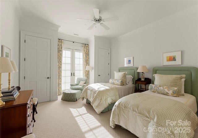 carpeted bedroom with ornamental molding, access to exterior, ceiling fan, and french doors