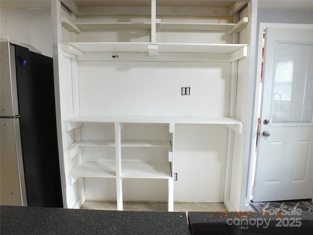 interior details featuring stainless steel refrigerator