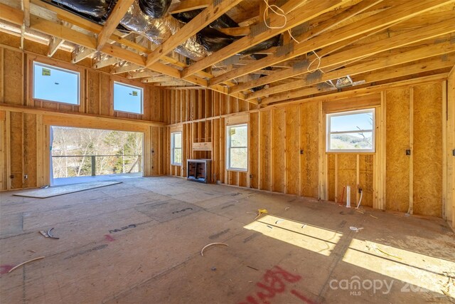 miscellaneous room featuring a high ceiling