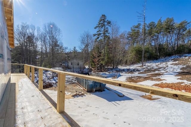 view of snow covered deck