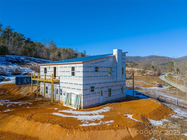 exterior space with a mountain view