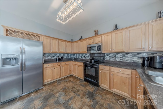 kitchen with tasteful backsplash, sink, stainless steel appliances, and light brown cabinetry