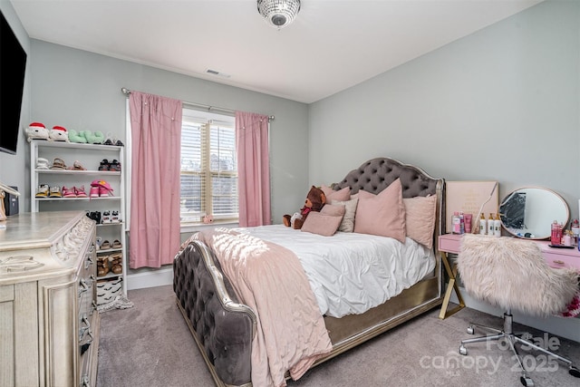 bedroom with carpet and visible vents