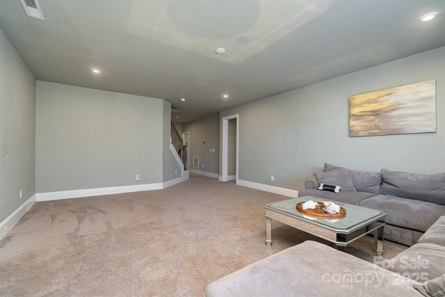 living room with recessed lighting, carpet flooring, visible vents, baseboards, and stairs