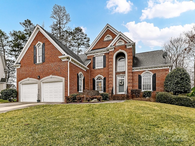 front facade featuring a garage and a front yard