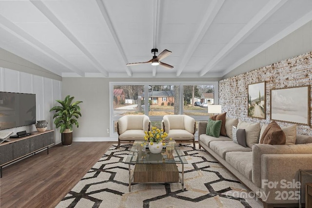 living room with hardwood / wood-style flooring, vaulted ceiling with beams, and ceiling fan