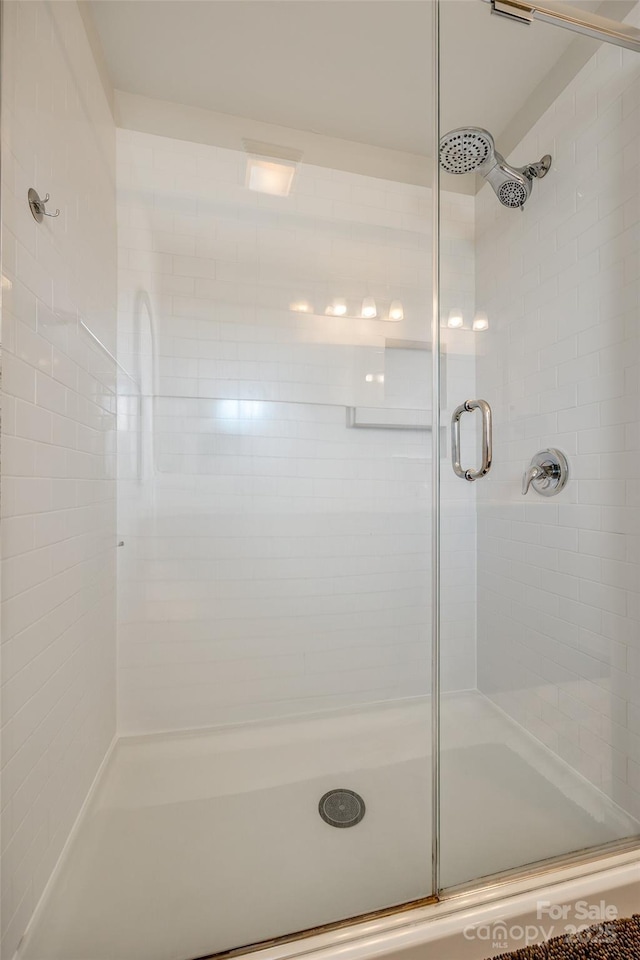 bathroom featuring walk in shower