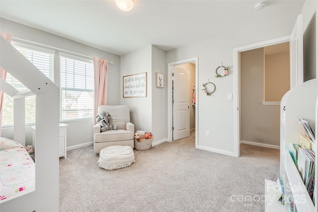 bedroom featuring light carpet