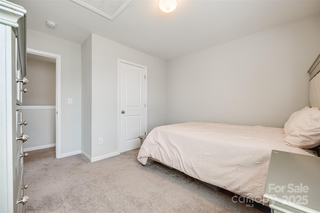 bedroom with light carpet