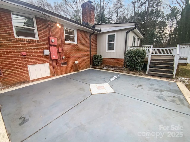 exterior space featuring a patio area and a deck