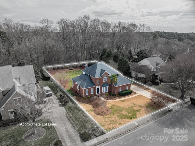 drone / aerial view with a forest view